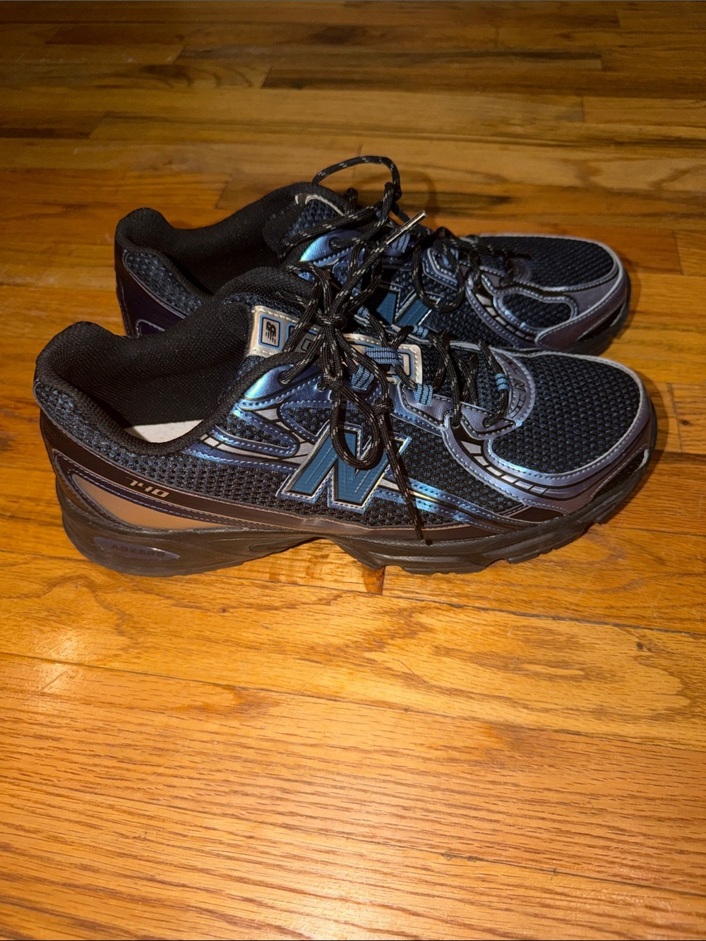 New Balance Black with Iridescent Blue Accent Running Shoes